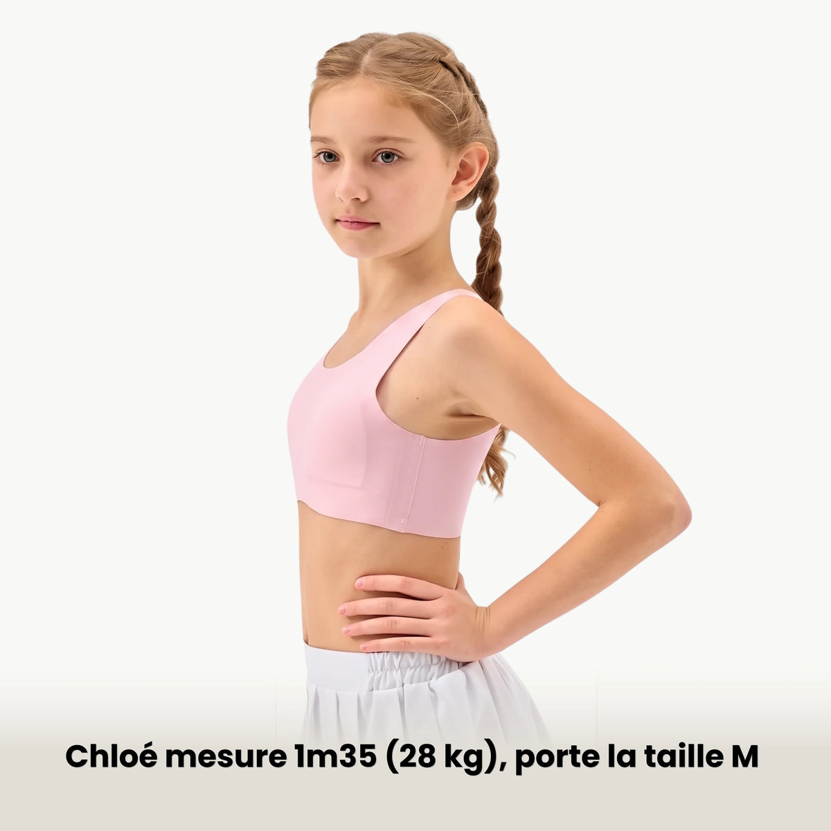 La Première Brassière portée de profil : 1,35 m, 28 kg, taille M